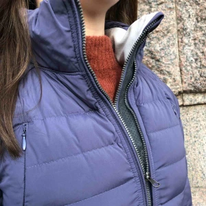 - Athletic thin down jacket. Nice color, good for running, two zippers for size and thumb holes. Reflective material on outside zipper