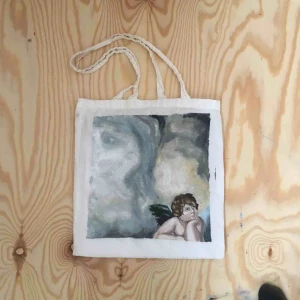  - Handmålad tygpåse, inspirerad av Michelangelo. Målningen är gjord på en återvunnen tygpåse, och målningen är gjord med oljefärg.