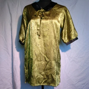 Vintage klänning - Superfin unik vintageklänning i guld/gul och svart