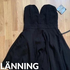 Klänning  - Klänning