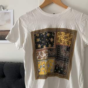 En fin t-shirt från Ginatricot, använd spartsamt 
