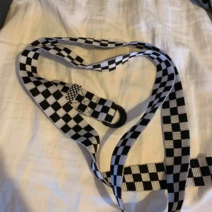  - Skärp från axel arigato