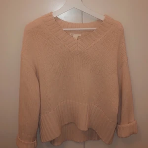 Stickad oversize tröja  - Ljusrosa oversize tröja 