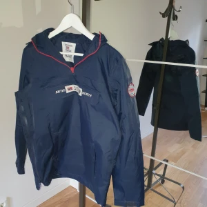 Annorak - Blå Jacka allvallväder 