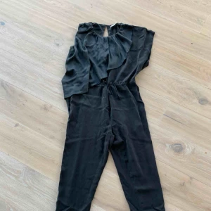  - Superfin jumpsuit från tiger of sweden, använd 1 gång.