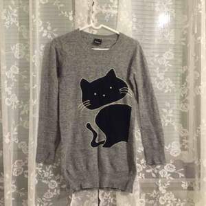 Only wore once, super nice cat sweater in wool, very warm! XS from Cubus.