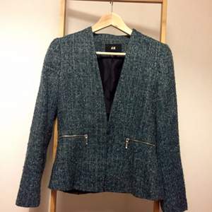 Green, blue tweed jacket with hook closure from H&M. Really comfortable and easy chic 