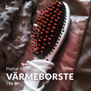Värmeborste som plattar håret  - En röd plupp råka gå av men inget som stör. 