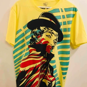  - Ny Modesty Blaise tee i storlek Large. 30:- plus frakt 18:- = 48:- totalt