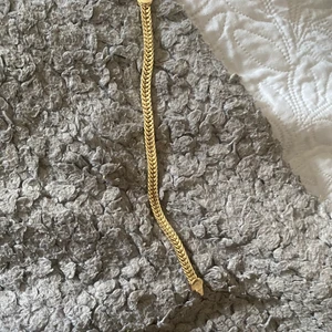 Armband - Guld armband doppad i guld, 18 k stämpel finns