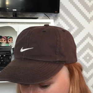 - Solblekt Nike keps, frakt 15kr