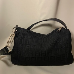 bag - a vintage small hand bag with Fendi print 