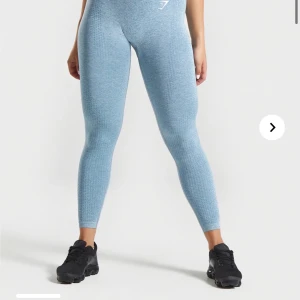 Gymshark - Fina träningstights i modellen vital seamless, färg Teal Marl i storlek M, ingår spårbar frakt!