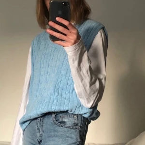 Ljusblå väst - Ljusblå väst köpt second hand