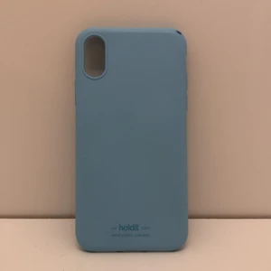 Mobilskal - Mobilskal till IPhone X från Holdit. Fin ljusblå färg dock 2 småskador i ena hörnet. Nypris 149kr. 