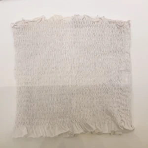 Vit topp  - Skick 7/10, använd ett fåtal gånger. Passar även en S.