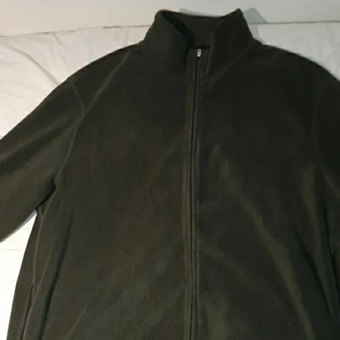 En H&M mörkgrön flis i storlek xxl - 90