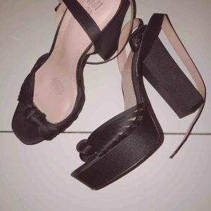  - Black Block heels.Used one time only.very comfortable.