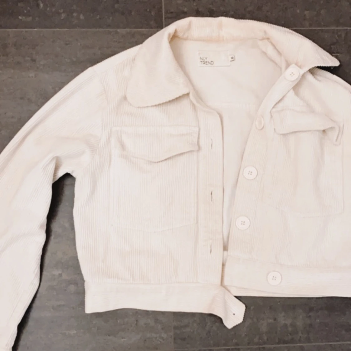 Vit manchesterjacka  - 91