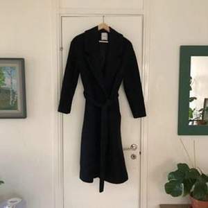Dark blue 100% wool coat from Mango. Great condition. Bought for 2,000 Sek. 