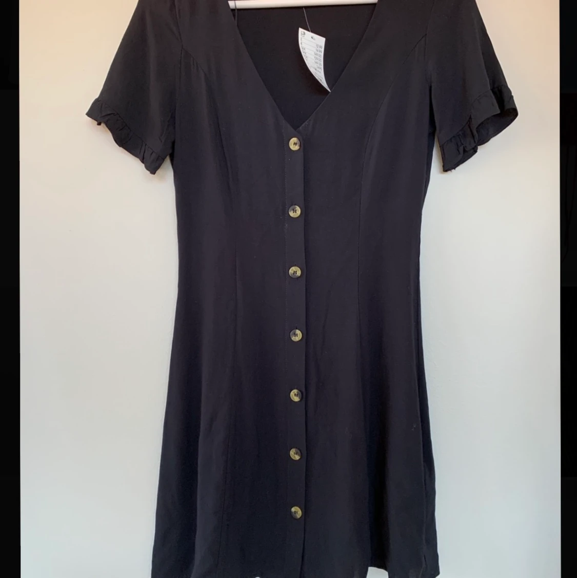 Kortklänning med knappar