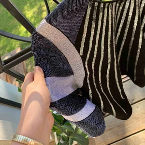  - Roligt festplagg, fina handsydda pärlor och dubbelt tyg