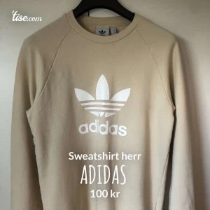 Adidas sweatshirt - Beige sweatshirt från Adidas i stl s, aldrig använd