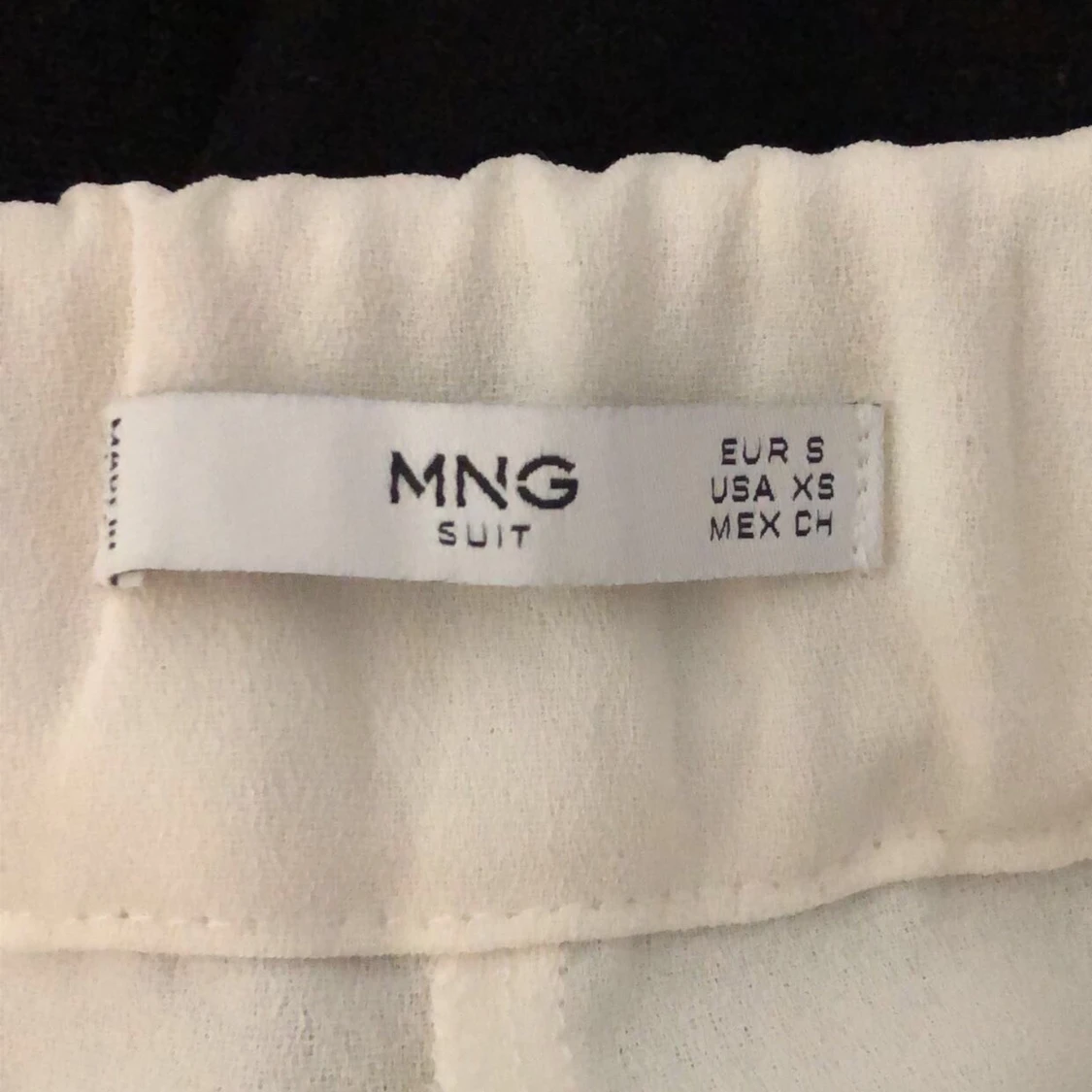 Vita vida byxor från MANGO - 91