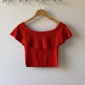 Zara off the shoulder ruffle orange knit top. Size M. Excellent condition, never worn.