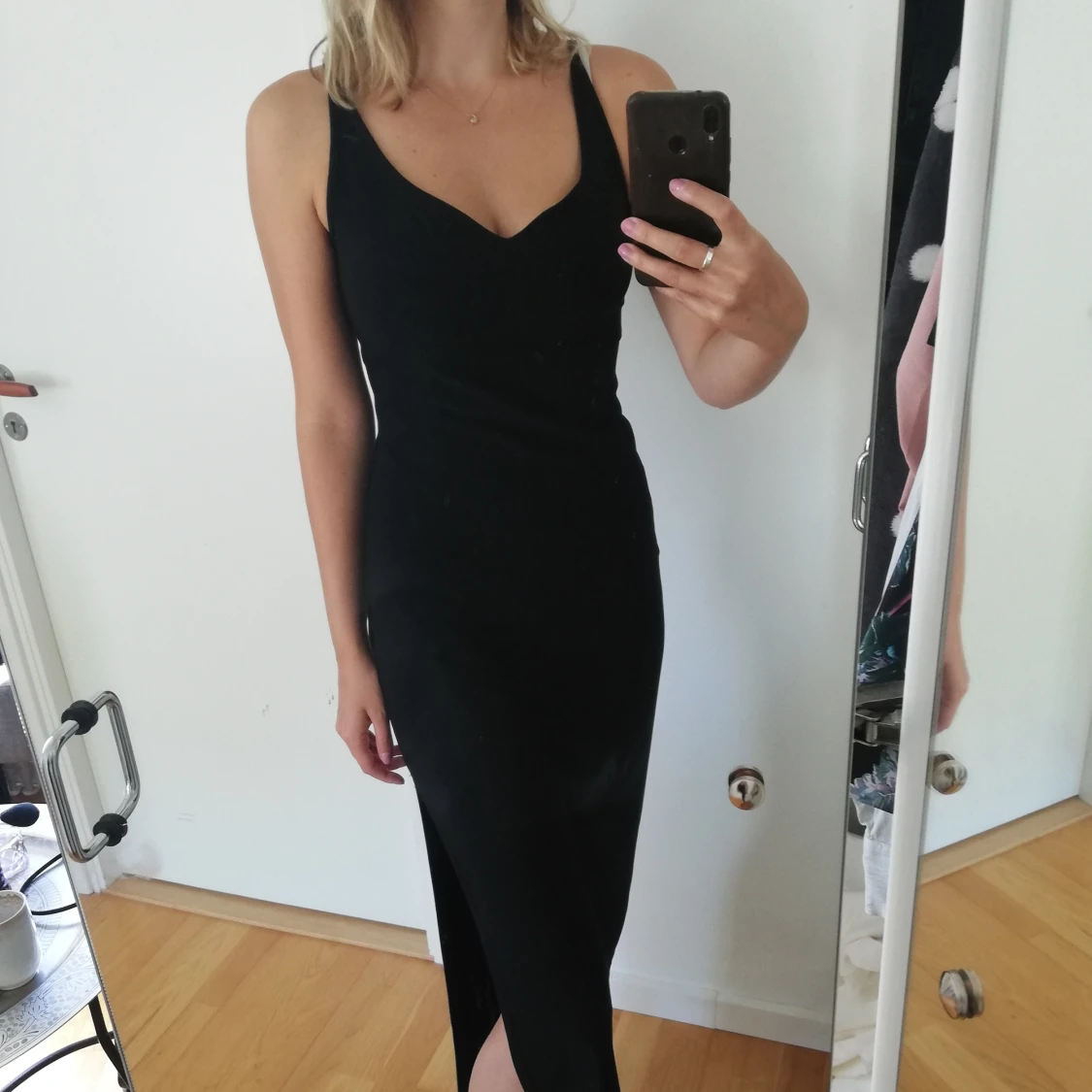 Svart klänning stretch strl 38
