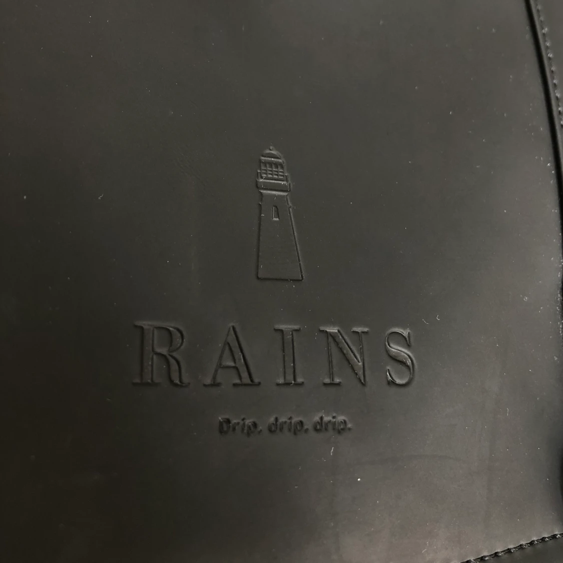 Svart ryggsäck Rains - 90