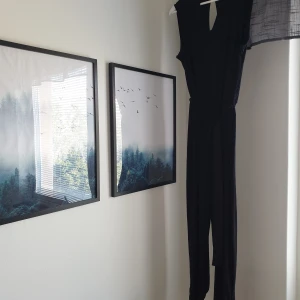 Black jumpsuit - Black jumpsuit with a belt. Stretchy fabric, so can fit sizes S-L. Worn only once 