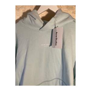 Brand new Acne Studios light blue pastel hoodie. Never worn and in perfect condition still with tags. Nice fit and on trend get it for a unique price before it’s too late. Size  on label says medium, but it’s very oversized so probably more about a L/XL! Also fits well as a oversized medium, model usually wears a M/L.