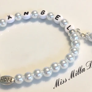 Du är en ”Ängel” Armband nytt - Helt ny elastiskt armband med gladpärlor, berlock ängel