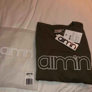  - Brun/grön klänning från aimn. Aldrig använd HAR ÄVEN EN I SVART JAG SÄLJER!!