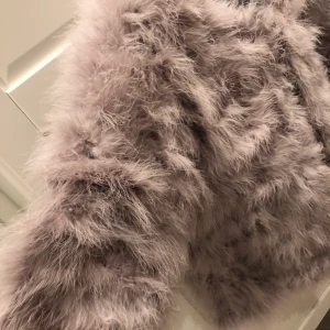 Fluffjacka - Snygg fluffjacka i ljus lila/grå nyansen. Som ny!