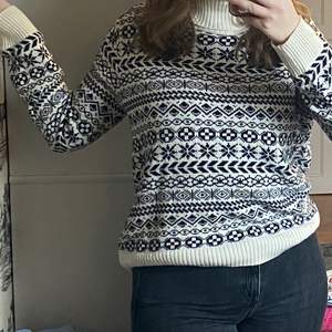 Knitted and patterned turtleneck. Used once. Price negotiable
