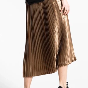 Guldig plisserad kjol - Från lager 157 och aldrig använd. Lång plisserad kjol med resår i midjan. Storlek M