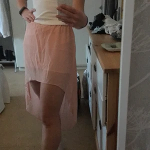 Kjol  - Rosa somrig kjol men resår i midjan 