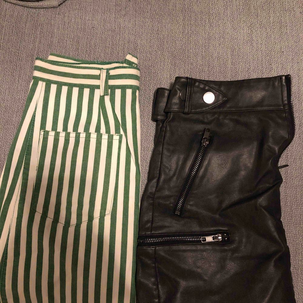 Två kjolar, den svarta från hm och den gröna från humana. 50kr/st nyskick!. Kjolar.