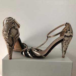 Gold - snake skin style high heels, super comfy, looks great for any occasion