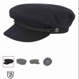  - En äkta Brixton Emil i Lönneberga keps. (Färg: Svart, storlek L) Använd den fåtal gånger och är i superfint skick. Nypris 500kr