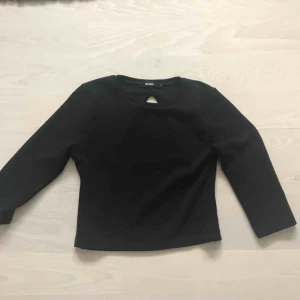  - Fin topp med cool rygg! Bra skick