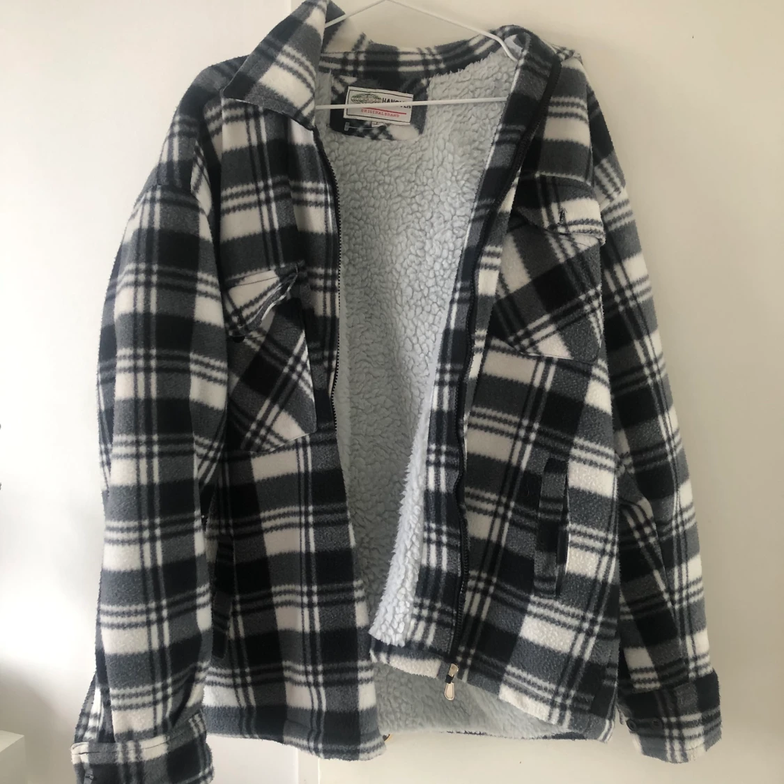 Trendig, rutig fleece-jackađđđœ