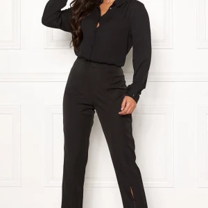 Kostymbyxor  - Helt nya kostymbyxor från bubbleroom. Oanvända med prislappen kvar. Säljer pga fel storlek. Nypris 400kr säljer för 300kr. Storlek xs! 