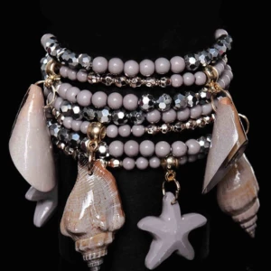  - Vackert armband med havsdekoration.Färg: gråStorlek: One SizeOBS: Örhängen finns att köpa separat. Fri frakt  https://www.nellasshop.com/products/bohemiskt-armband-gra