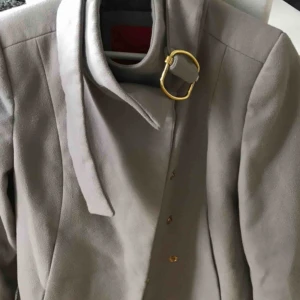  - Mango kappa i storlek s.  Frakt ingår i priset 