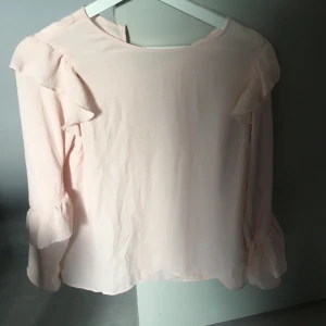 Ljus rosa blus - Använd en gång