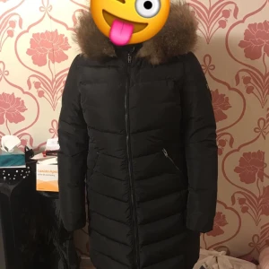 Vinterjacka  - En vinterjacka med äkta päls inte använd 
