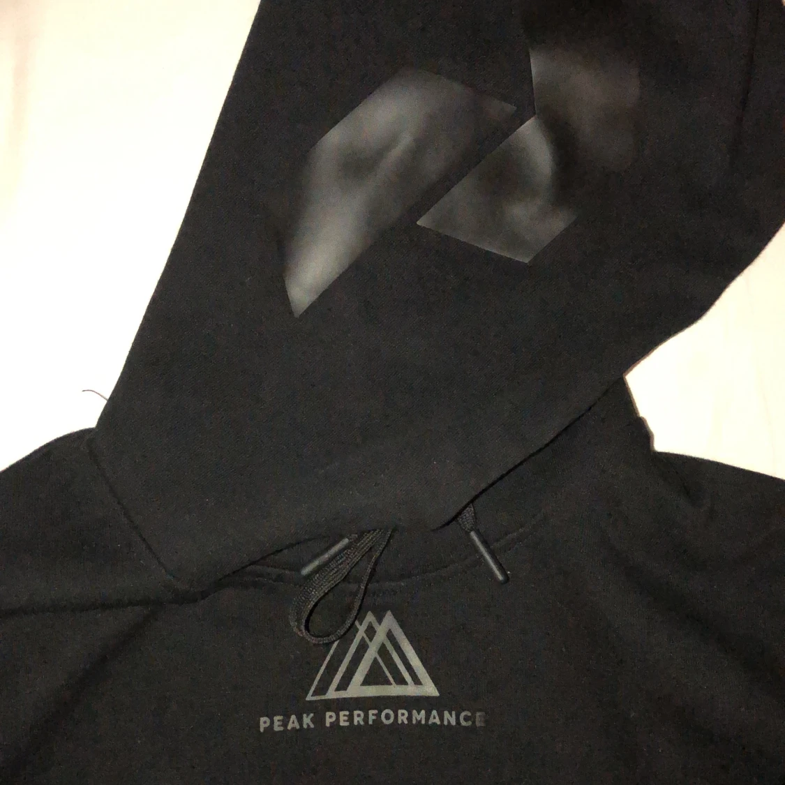 Peak Performance svart hoodie S